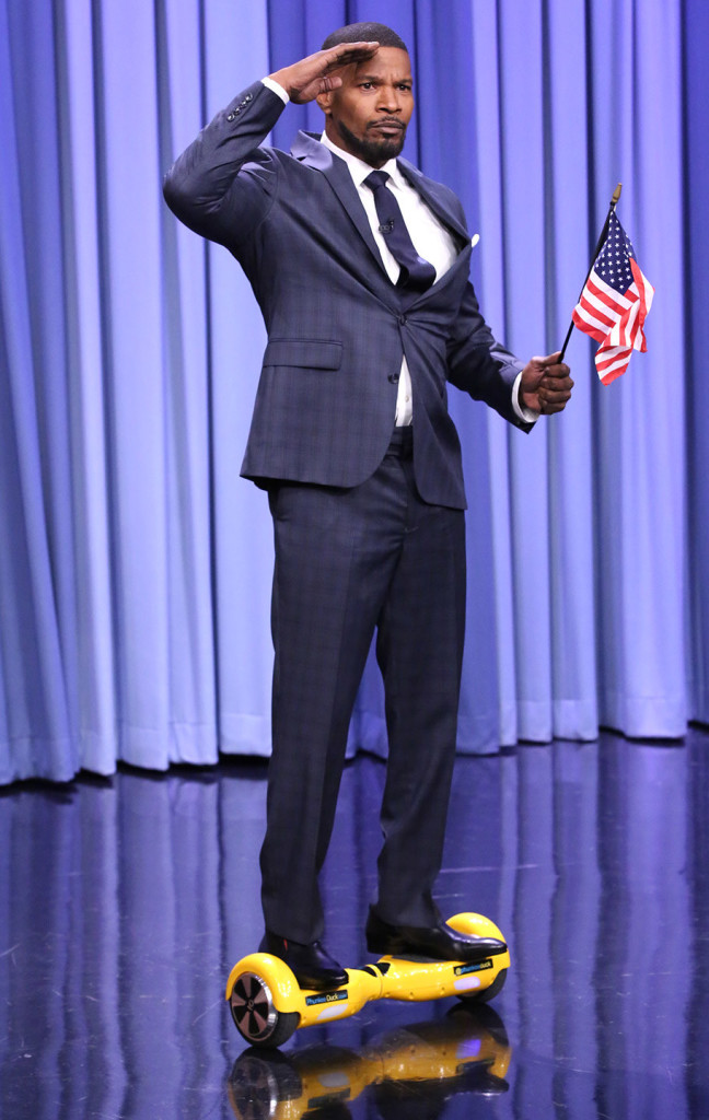 Jamie Foxx riding an hoverboard
