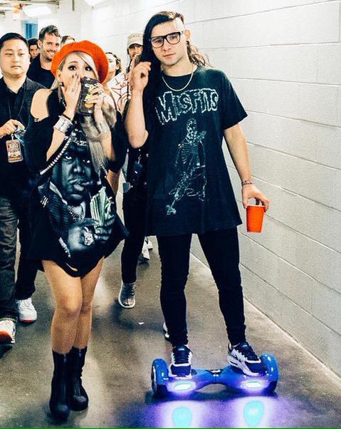 Skrillex riding a hoverboard
